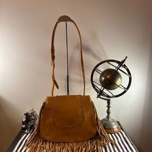 Henri Bendel tan leather fringe front flap crossbody purse